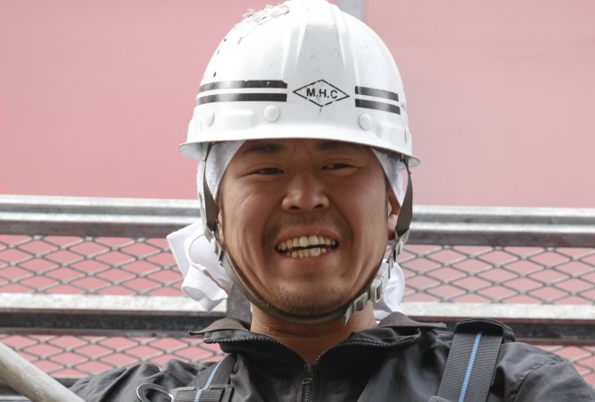 川島工業の社長、川島完一さんビル上